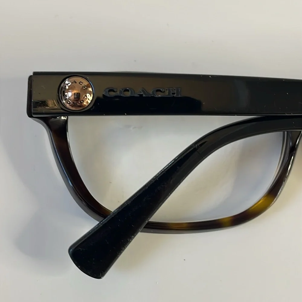 Coach women’s eyeglasses and case.‎ Frames only. Coach logo on temples. Black.